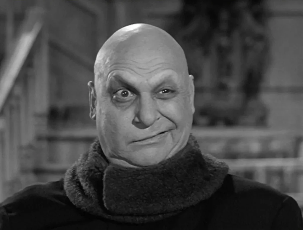 Jack Coogan como Tio Fester em A Família Adams (1964-1966).